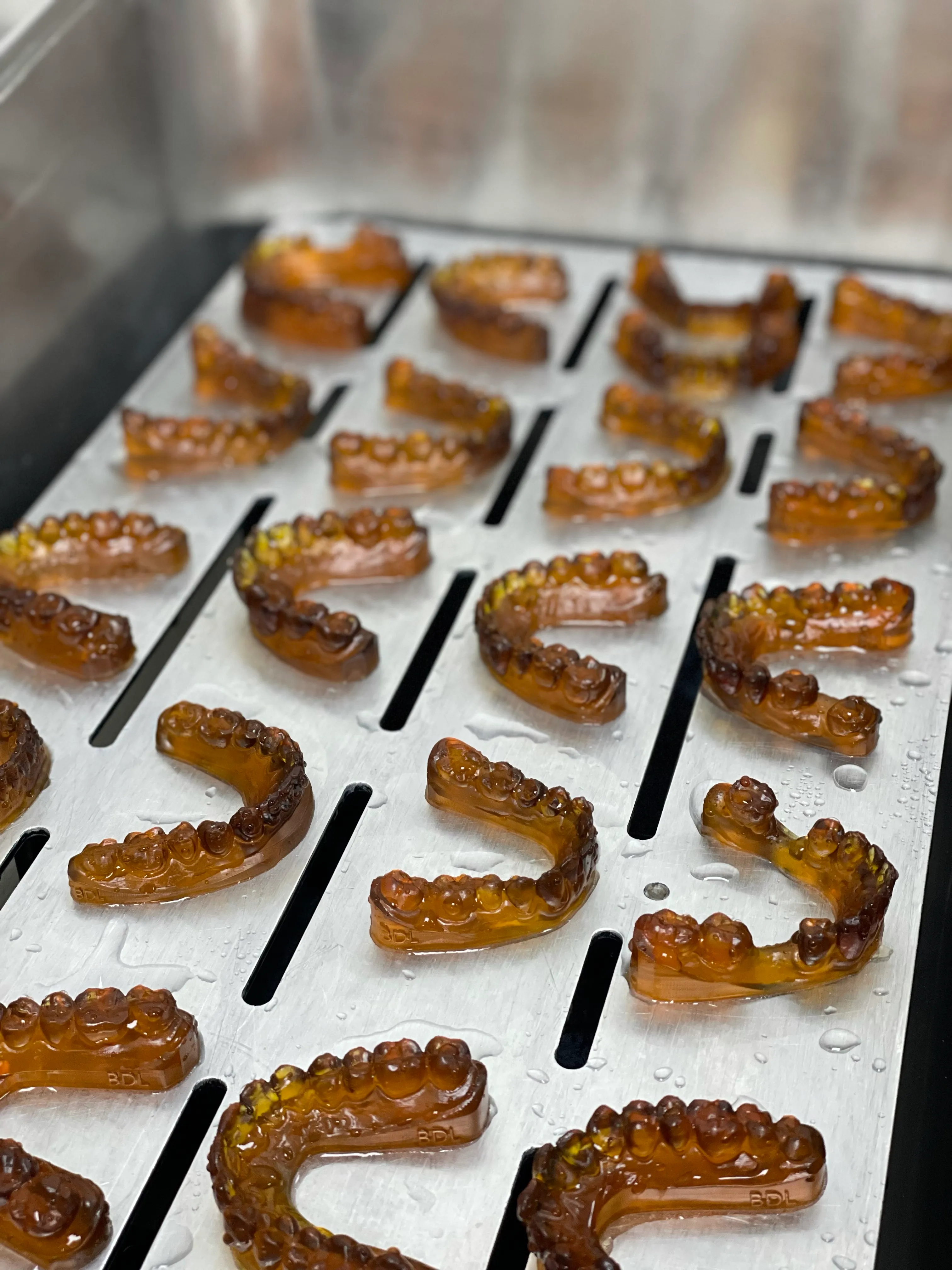 3D-printed dental models drying at the Bridge Dental Laboratory