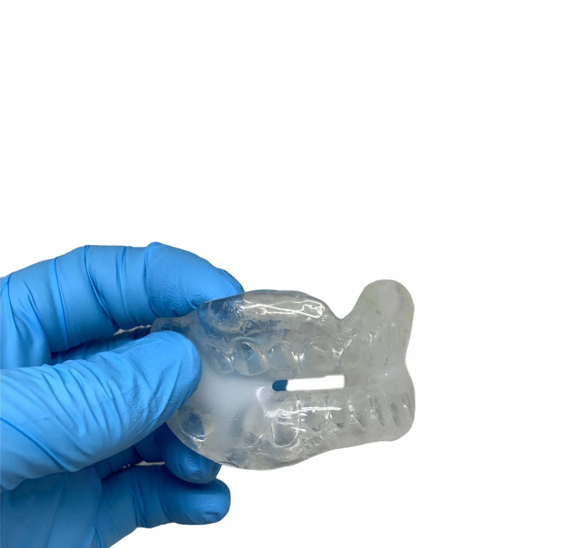 Fused one-piece snoreguard in clear acrylic with breathing slot